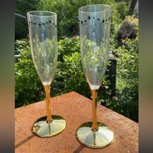 Gold and Black Star Plastic Champagne Flutes